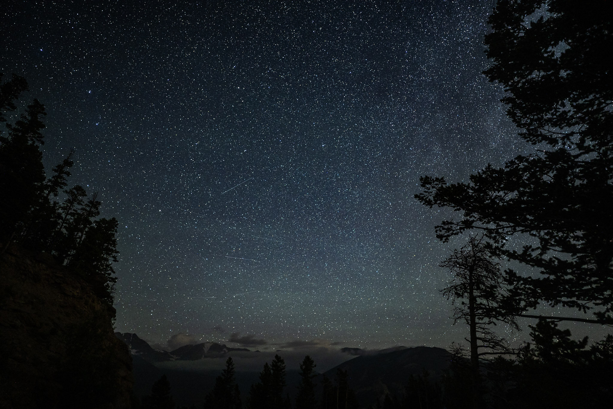 astrophotography long exposure over canyon rim